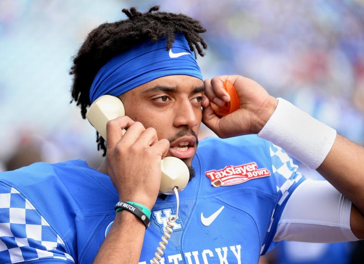 Then-Kentucky quarterback Stephen Johnson talked with the coaches’ box during UK’s 33-18 loss to Georgia Tech in the 2016 TaxSlayer Bowl.