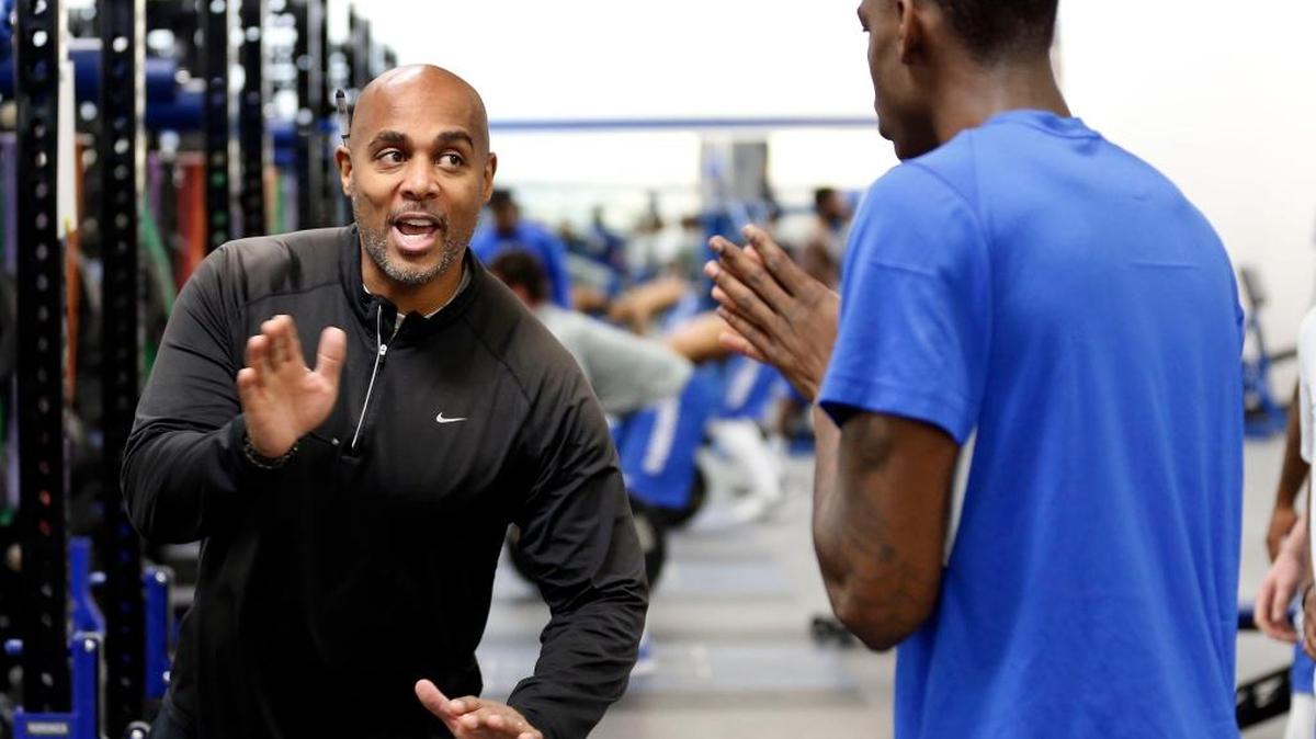 UK strength and conditioning coach Corey Edmond gave direction to cornerback Chris Westry as part of the football team took part in a weightlifting session in the E. J. Nutter Training Facility on Friday. Edmond often arrives at 5 a.m. to spend plenty of time with players.