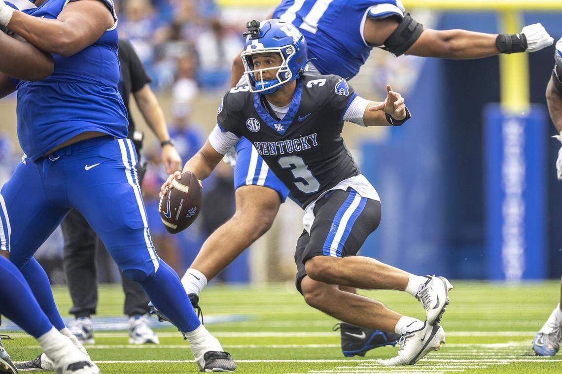Kentucky Wildcats quarterback Kenny Minchey (3) scrambles during the Kentucky football Blue-White spring game at Kroger Field in Lexington, Ky., on Saturday, April 18, 2026.