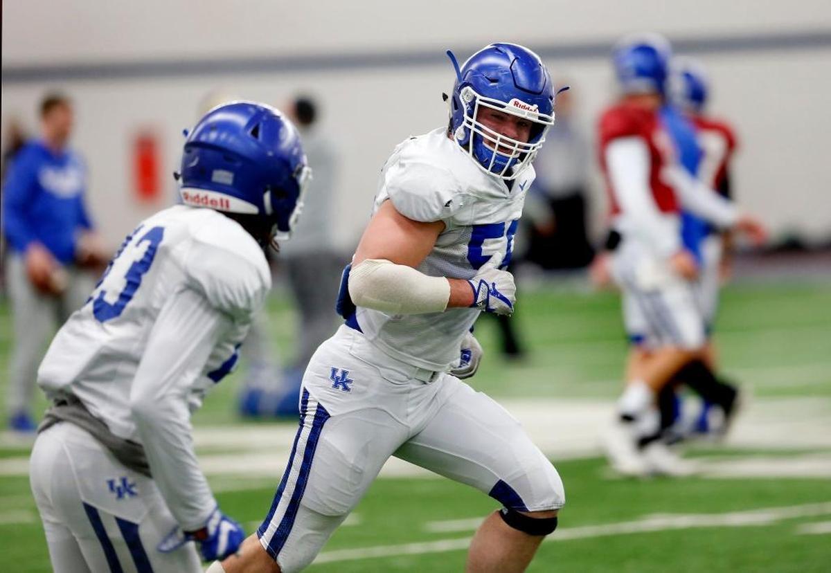 Kentucky linebacker Kash Daniel, right, “is gaining a lot of confidence,” Coach Mark Stoops said. “I like the way he’s playing.”