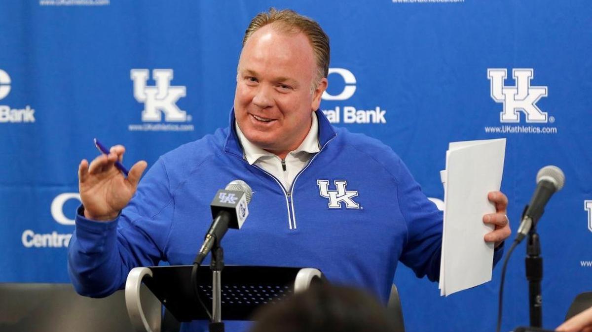 UK football coach Mark Stoops talked Monday during a news conference during which he introduced new offensive coaches Darin Henshaw and Eddie Gran.