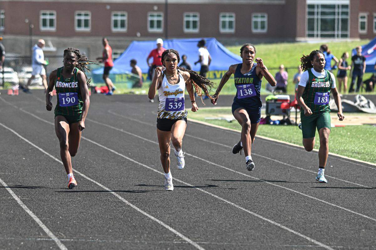 Woodford County eighth grader Hannah McColl won the 100-meter dash to help her team to a Region 6 title on May 17, 2025.