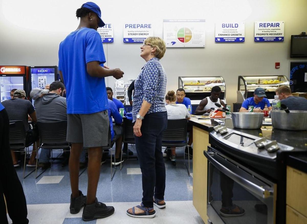 University of Kentucky basketball player Jarred Vanderbilt speaks with Director of Nutrition Monica Fowler during a cooking lesson as part of the "My New Kentucky Home" program at the E.J. Nutter Training Facility in Lexington, Ky., Thursday, July 6, 2017. My New Kentucky Home helps teach first year student athletes college living.
