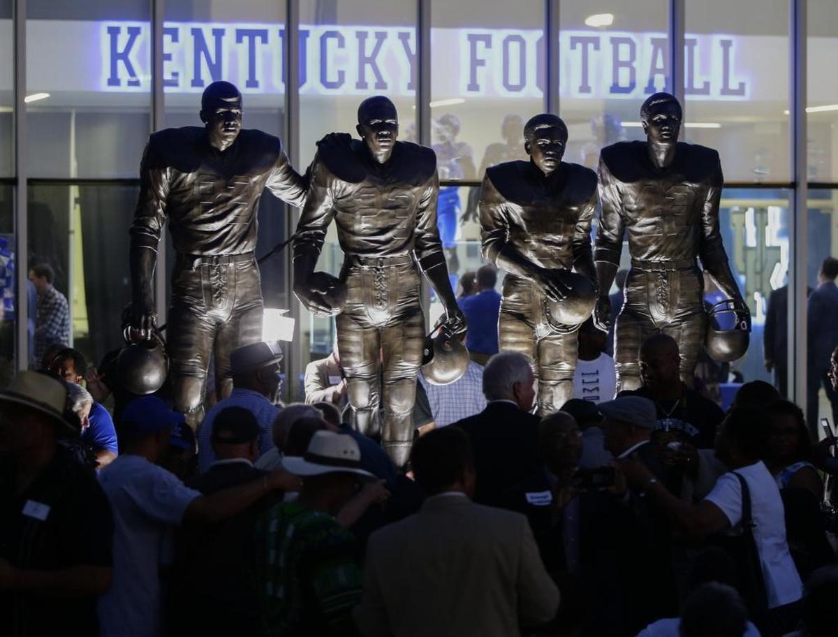The University of Kentucky unveiled a statue of the four football players who broke the SEC color barrier — Nate Northington, Greg Page, Wilbur Hackett and Houston Hogg — in front of its practice facility in 2016.
