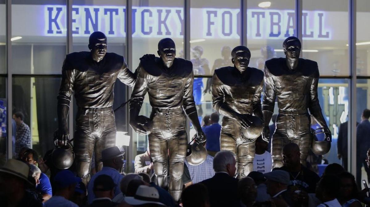 UK unveiled a statue of four football players who broke the SEC color barrier — Nate Northington, Greg Page, Wilbur Hackett and Houston Hogg — in front of its new practice facility in 2016.
