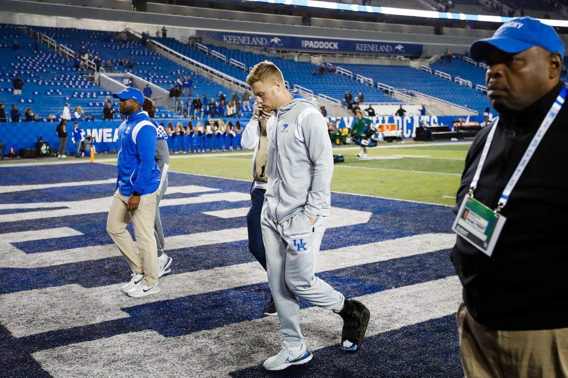 An injured Kentucky quarterback Will Levis (7) walked off the field after watching the Wildcats lose to South Carolina 24-14 in 2022 at Kroger Field.