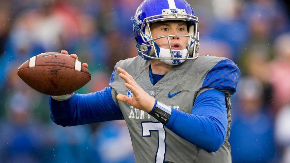 Kentucky quarterback Drew Barker threw a pass in the second half. The University of Kentucky hosted the University of Louisville, Saturday, Nov. 28, 2015 at Commonwealth Stadium in Lexington.