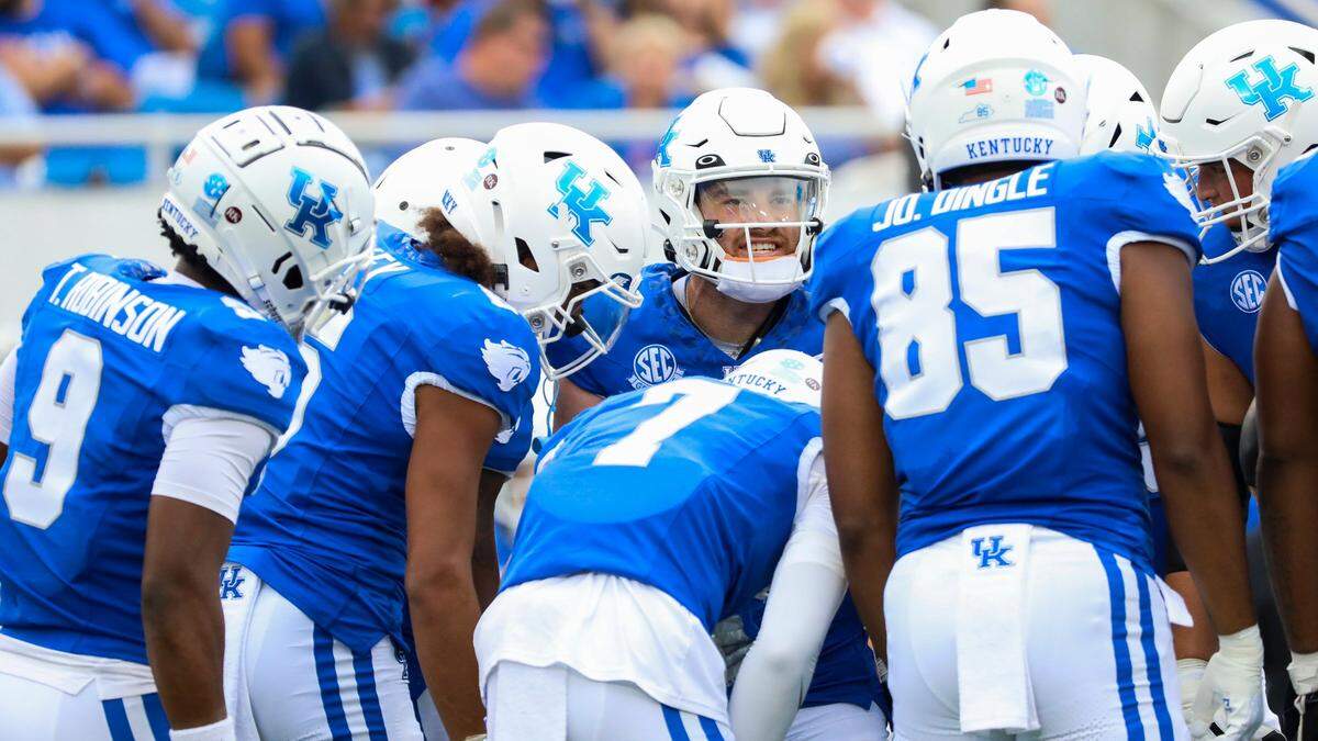 Kentucky Wildcats quarterback Devin Leary’s (13) calls a play in the huddle during a football game against Eastern Kentucky at Kroger Field in Lexington, Ky., Saturday, Sept. 9, 2023.