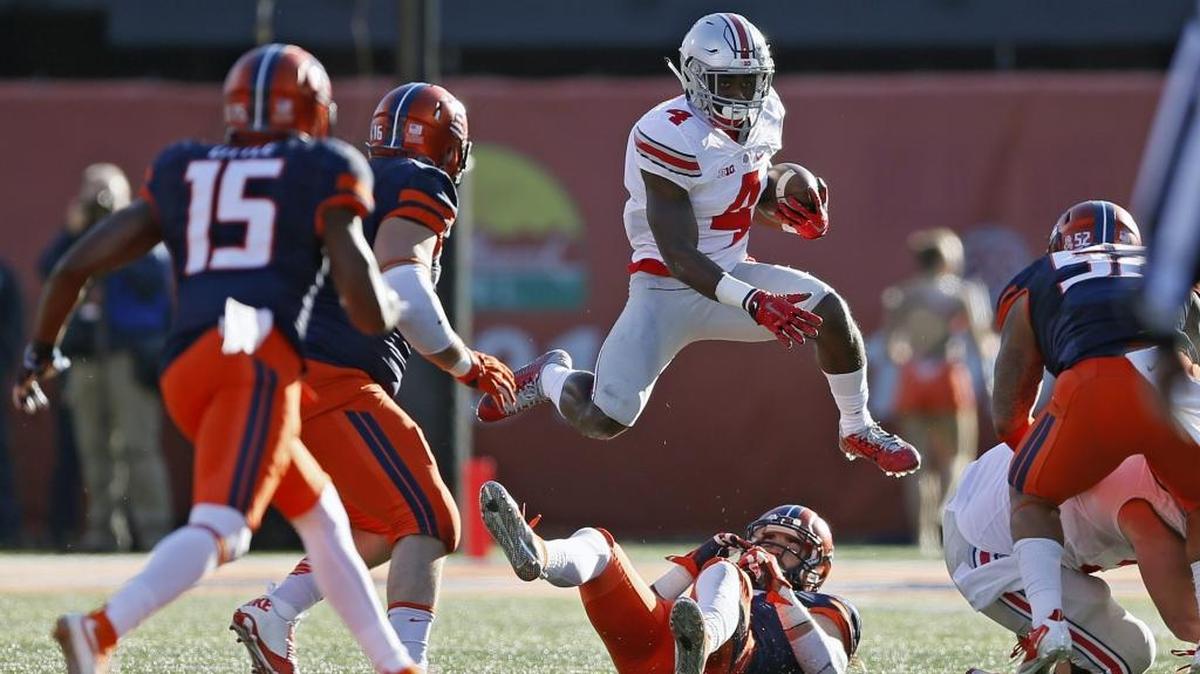 Ohio State running back Curtis Samuel (4) picks up yardage against Illinois in the second half at Memorial Stadium in Champaign, Ill., on Saturday, Nov. 14, 2015. Ohio State won, 28-3.