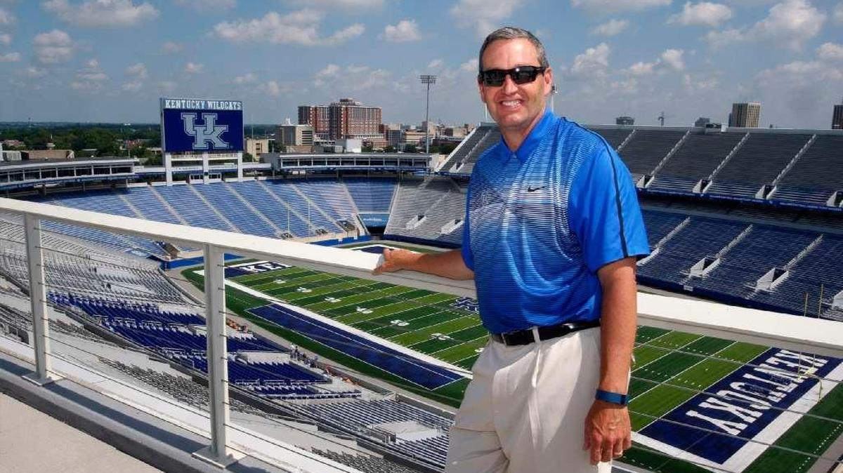 Kentucky Athletics Director Mitch Barnhart will earn $195,000 more in salary this year than last under terms of a new amendment to his contract.