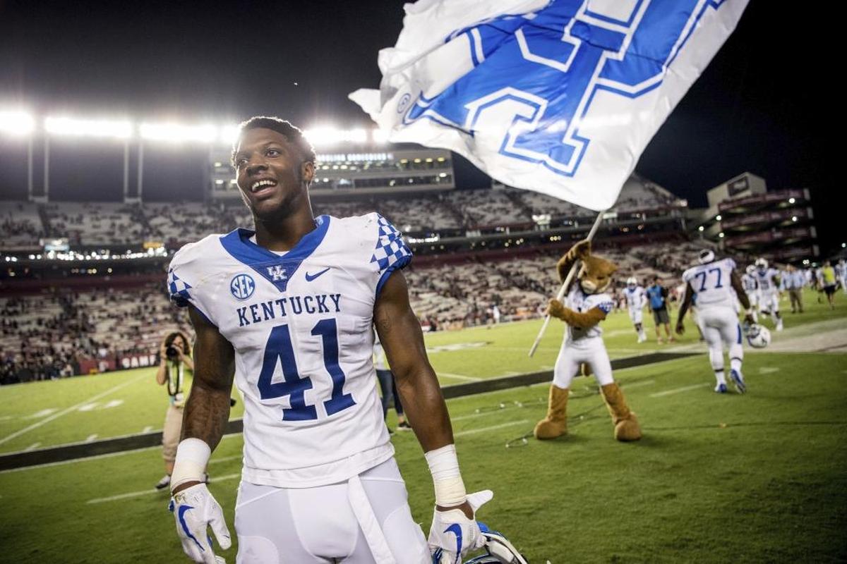 Kentucky linebacker Josh Allen (41) celebrated with fans after the team’s win against South Carolina on Sept. 16.