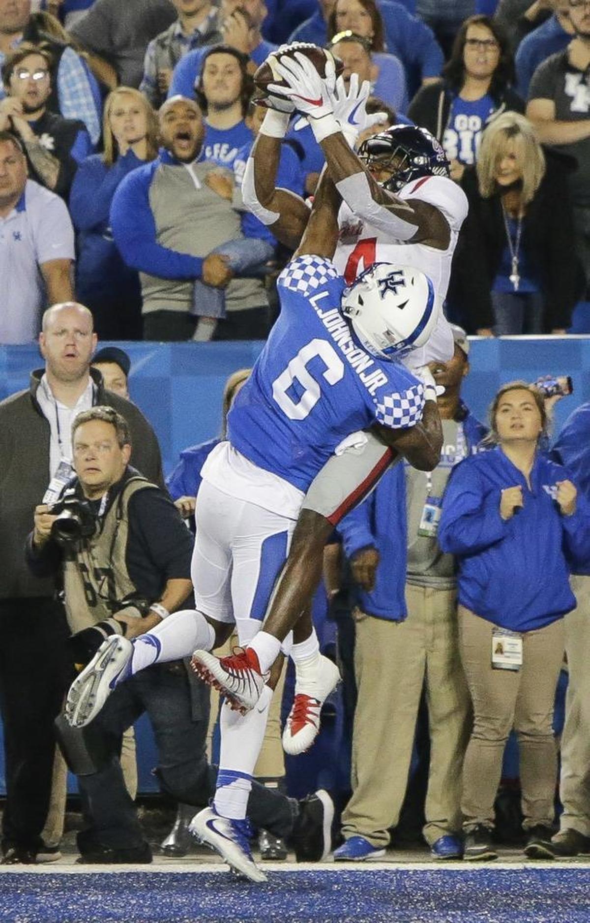 Mississippi wide receiver D.K. Metcalf caught the winning touchdown over Kentucky cornerback Lonnie Johnson with five seconds remaining last Saturday.