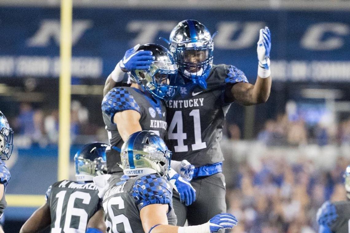 Kentucky Wildcats wide receiver Charles Moushey (84) and Josh Allen (41) celebrated downing a punt near the 1 yard line in the first half as UK hosted Florida at Kroger Field on Saturday Sept. 23, 2017 in Lexington.