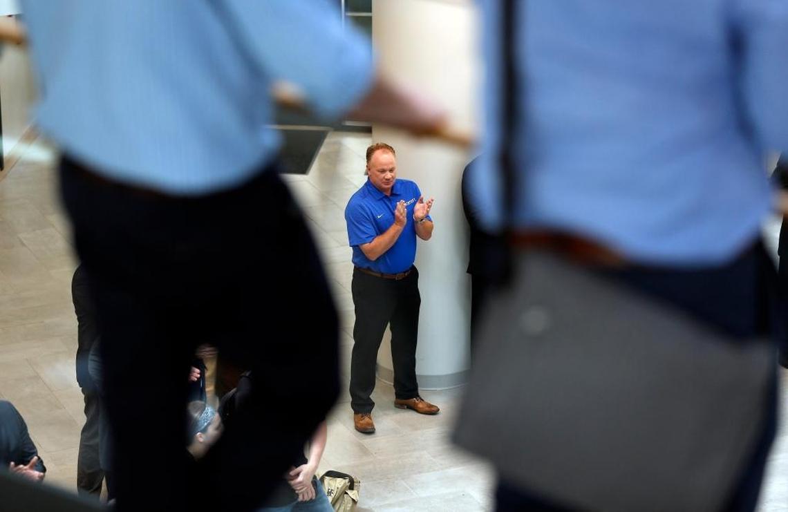 UK head football coach Mark Stoops listened during Monday’s news conference announcing the university’s partnership with Kroger.