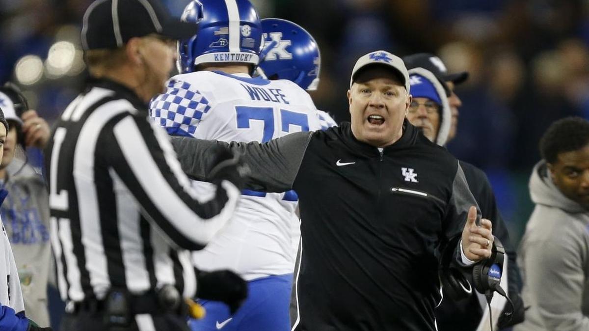 Kentucky head coach Mark Stoops argued with a referee as the Wildcats played Northwestern in the Music City Bowl in Nashville on Dec. 29.