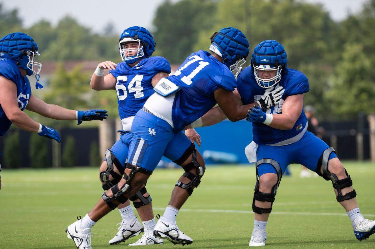 Of Kentucky redshirt freshman offensive lineman Malachi Wood (71), Mark Stoops says, “He has the right mindset, he has the right mentality ... and he has the ability, so you’ve just got to continue to bring him along.”