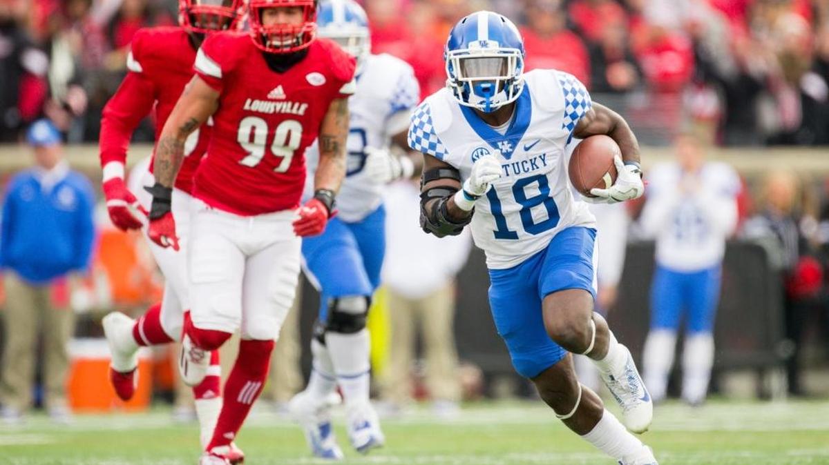 Boom Williams looked for room to run during Kentucky’s win over Louisville.