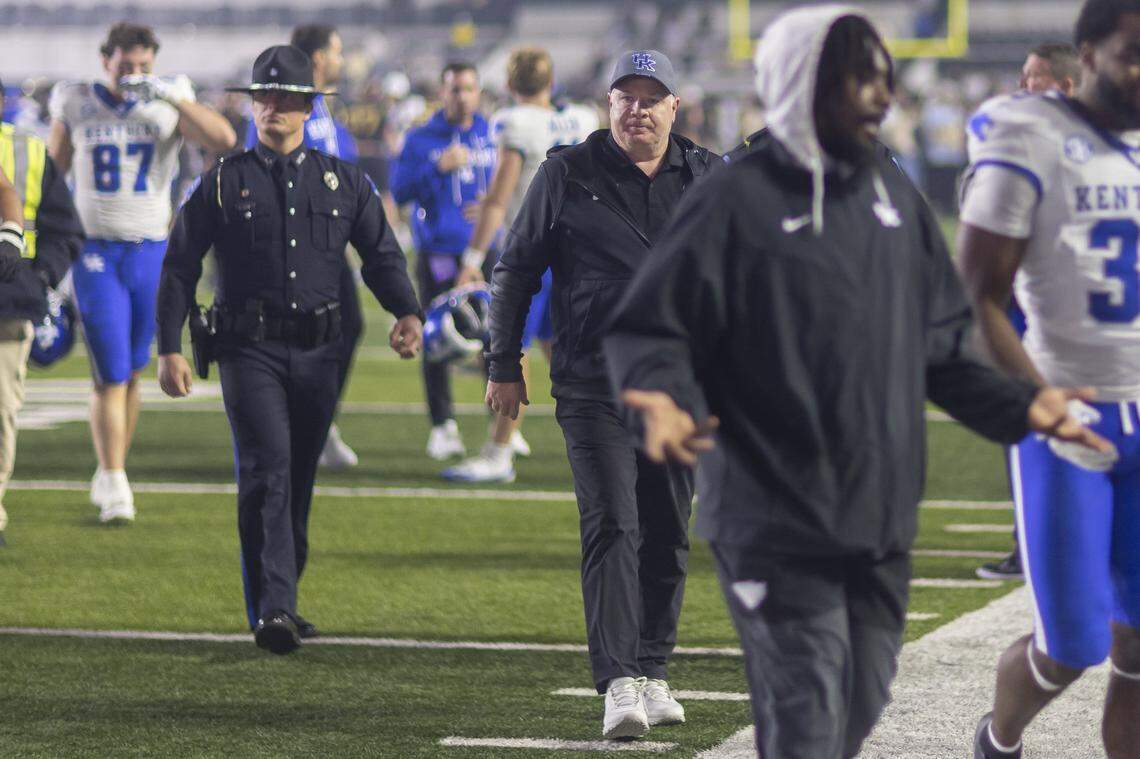 Kentucky head coach Mark Stoops walks off the field following Saturday’s loss to Vanderbilt at FirstBank Stadium in Nashville, Tennessee.