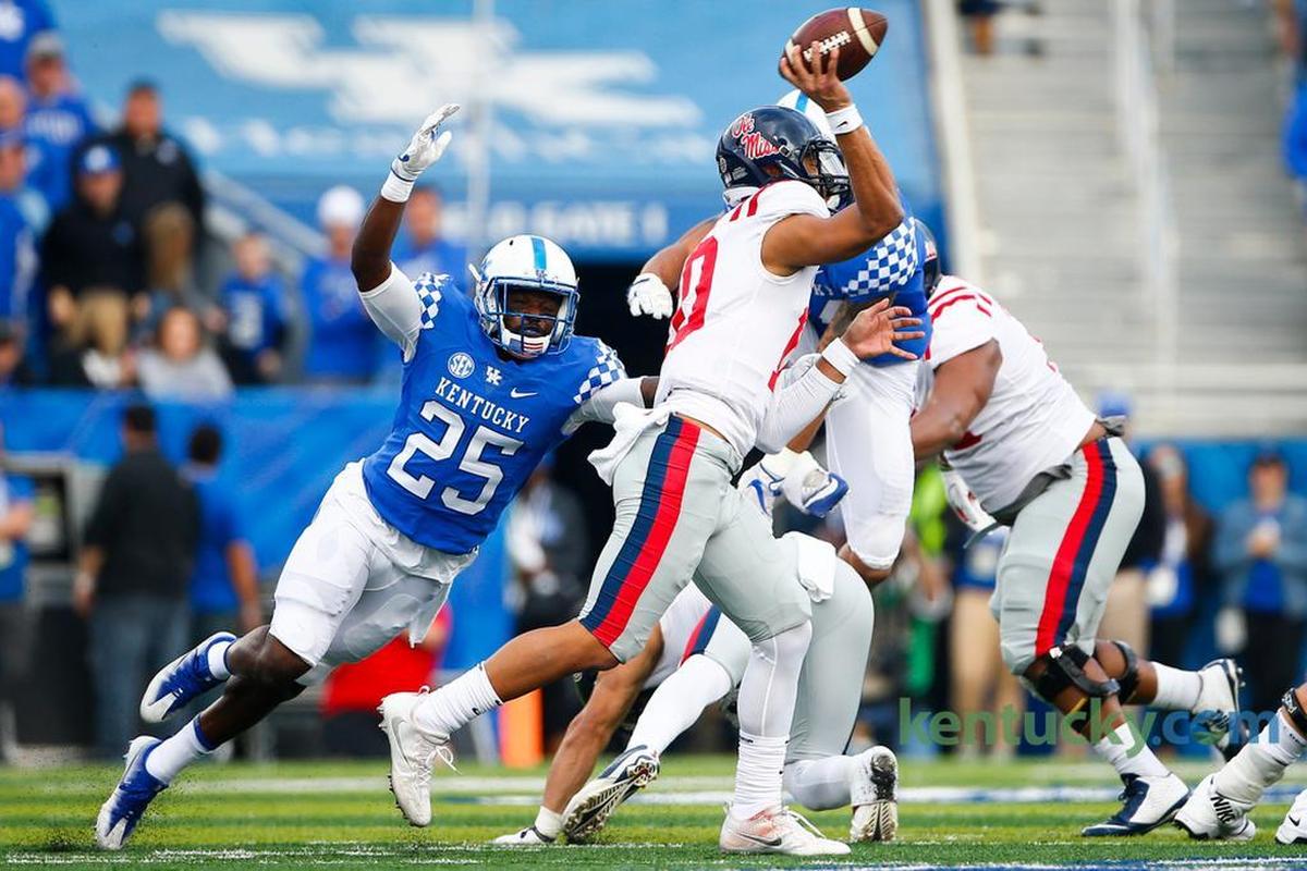 Mississippi Rebels quarterback Jordan Ta’amu (10) passed the ball under pressure from Kentucky safety Darius West (25) last season. The junior finished third on the team in tackles last season with 86 and had seven different games with at least seven tackles.