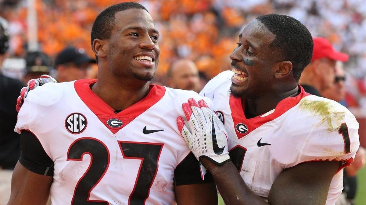 Georgia tailbacks Nick Chubb (27) and Sony Michel (1) have combined to produce 1,625 yards and 19 touchdowns this season.