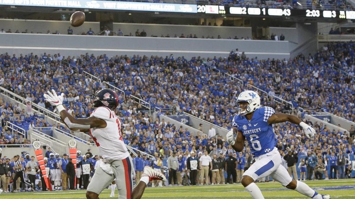 Mississippi wide receiver D.K. Metcalf caught a touchdown pass in front of Kentucky cornerback Lonnie Johnson during the second half last Saturday.