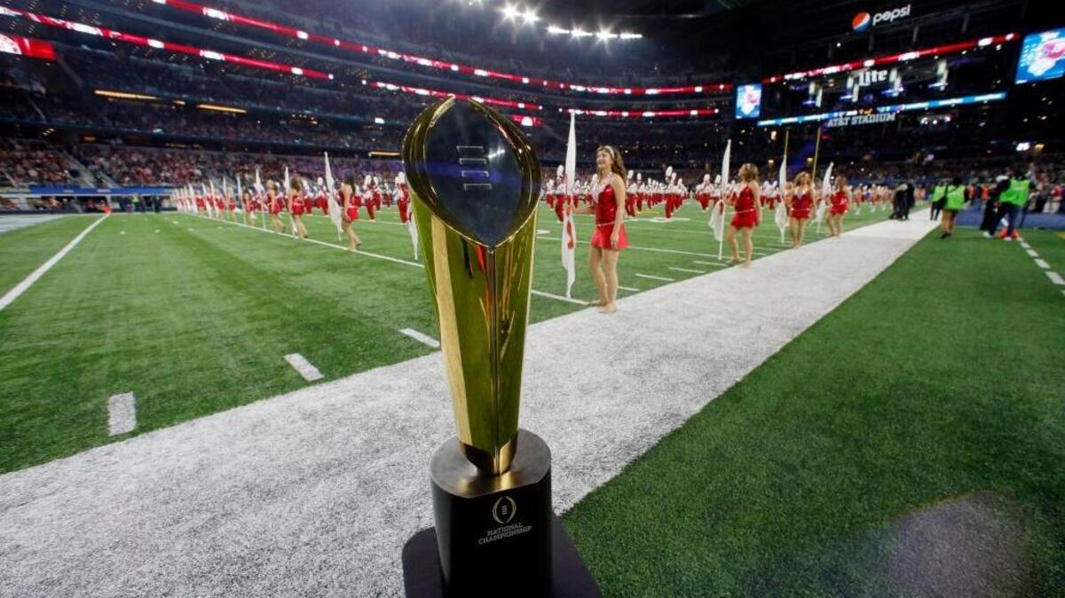 The battle for the College Football Playoff national title trophy concludes Jan. 9 in Tampa, Fla.