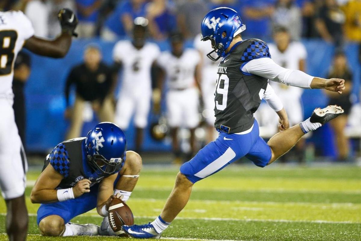 Kentucky Wildcats place kicker Austin MacGinnis (99) kicks a 35-yard field goal during a game against the Missouri Tigers at Kroger Field in Lexington on Saturday.