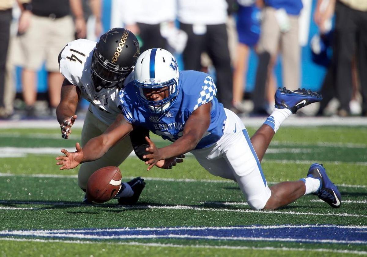 Eli Brown, here recovering a fumble against Vanderbilt last season, said he expects Kentucky’s most physical game of the season so far at Mississippi State on Saturday.