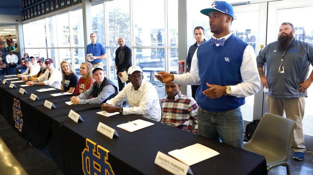 UK football player Davonte Robinson spoke after signing his national letter of intent at Henry Clay High School in February 2016. Starting this year, Division I football players have the option of signing their scholarship papers in December or can wait until February.
