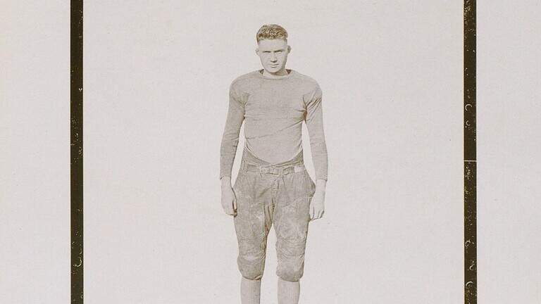 In 1923, a UK football player died. McLean Stadium was named in his honor