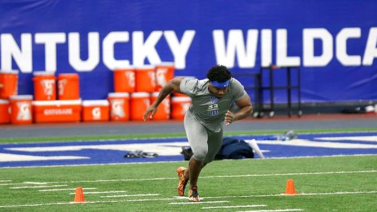 Kentucky Wildcats linebacker Ryan Flannigan (33) ran the 40-yard dash during University of Kentucky football NFL Pro Day held in the Nutter Indoor Facility on the UK campus in Lexington, Ky., Friday, March 4, 2016. Draft-eligible players had the chance to showcase their skills before scouts and player personnel from nearly every NFL team.