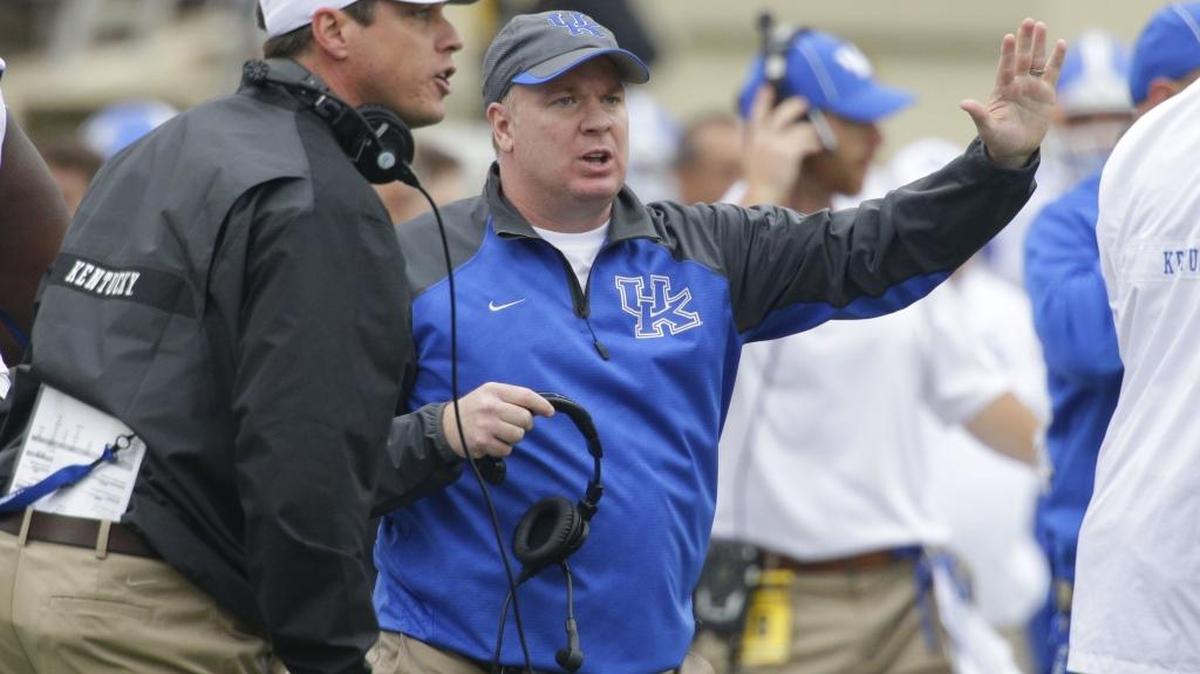 Kentucky Coach Mark Stoops, right, and defensive coordinator D.J. Eliot watched from the sideline during a 2013 game at Vanderbilt.