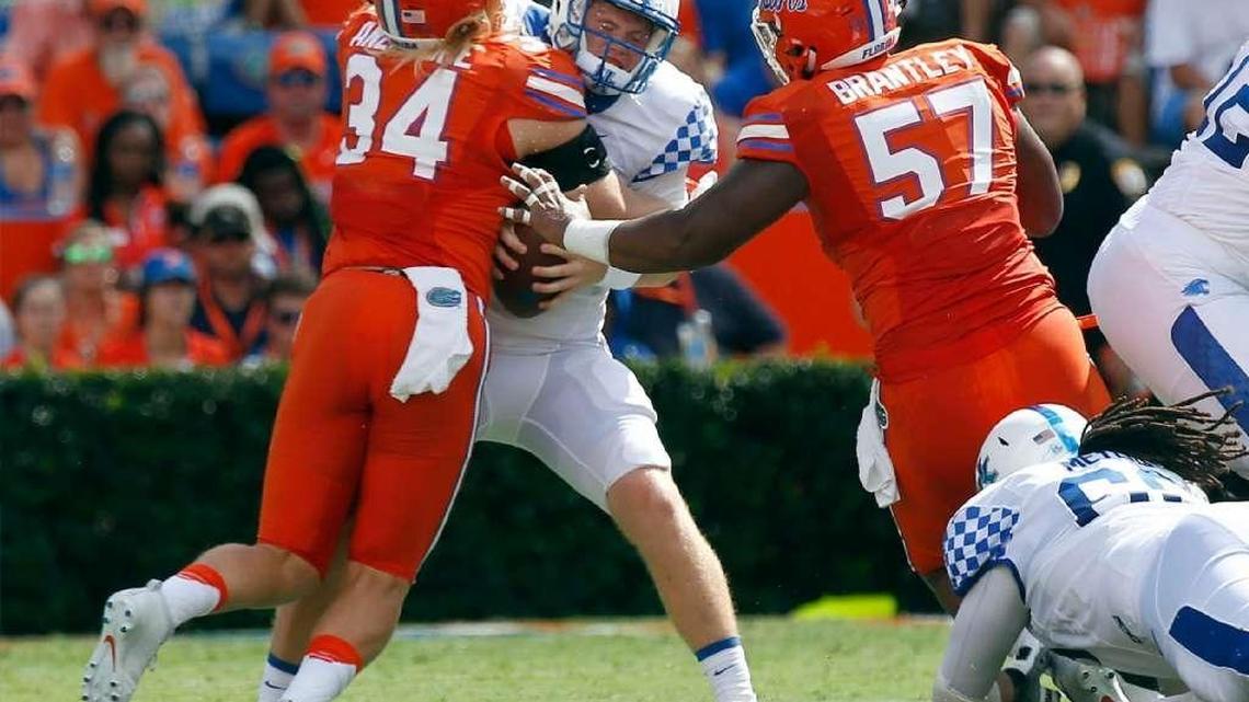 Kentucky quarterback Drew Barker’s father, Terry, thinks a sack by Florida linebacker Alex Anzalone on the first play of UK’s 45-7 loss in Gainesville may have exacerbated the back problems that caused the UK QB to miss the final nine games of the season.
