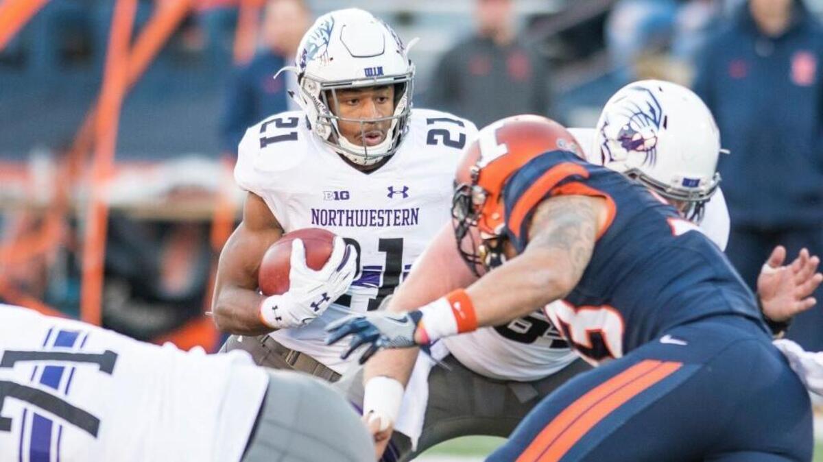 Northwestern running back Justin Jackson (21) is one of only six players in Big Ten history to run for more than 5,000 career yards