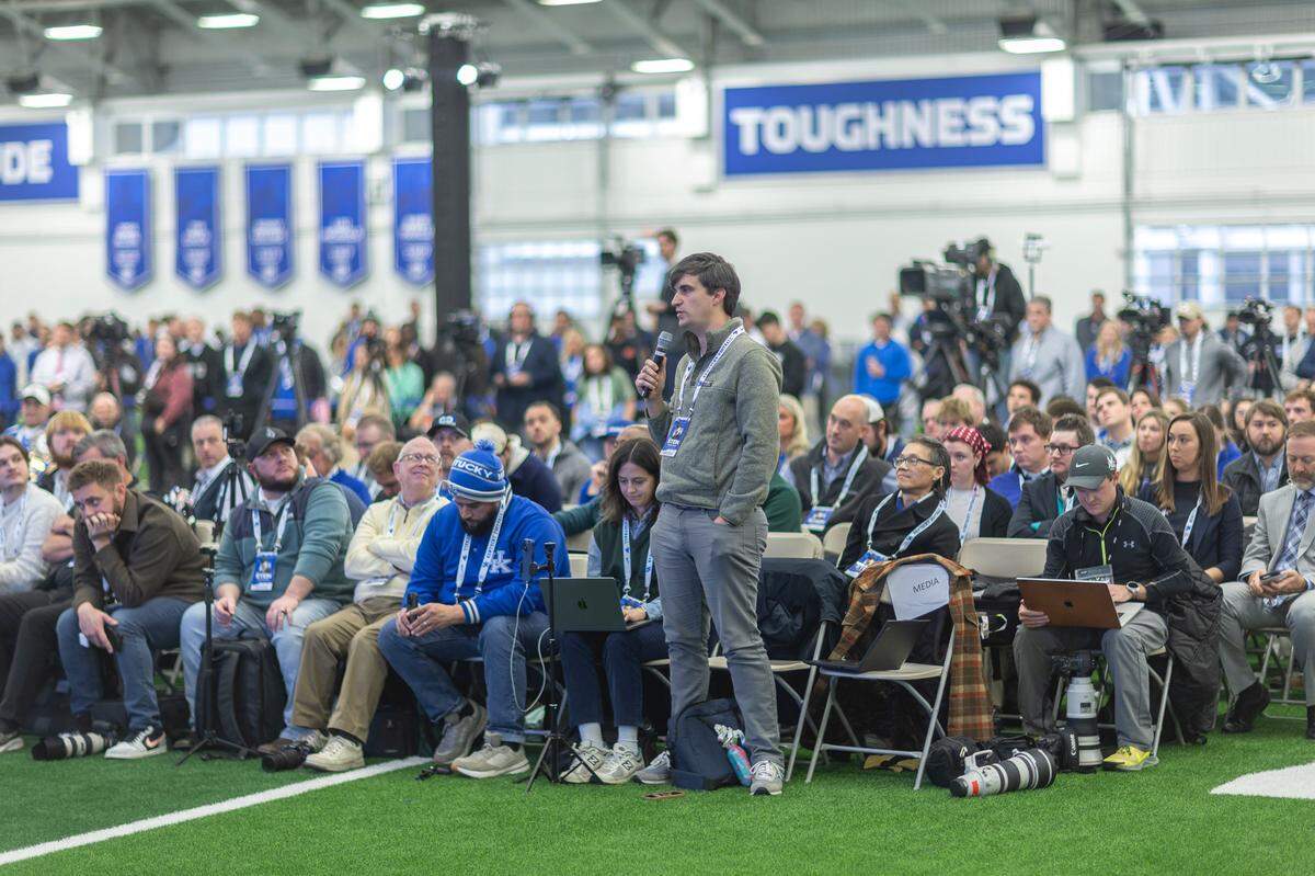 Herald-Leader staff writer Jon Hale asks a question at the introductory news conference for Kentucky football coach Will Stein on Dec. 3, 2025. Hale, who has covered UK athletics at a range of outlets since 2011, was named this week the National Sports Media Association’s Kentucky Sportswriter of the Year.