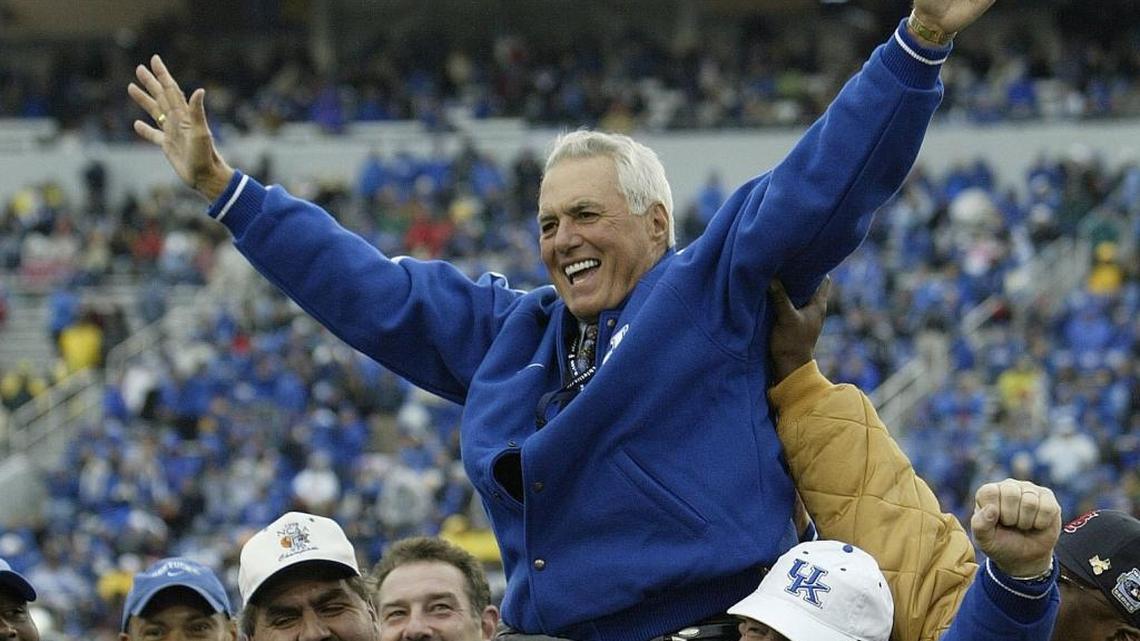 Coach Fran Curci got a ride on the shoulders of members of Kentucky’s 1976 SEC co-championship team in Commonwealth Stadium in 2006 on the 30-year anniversary of their league title.