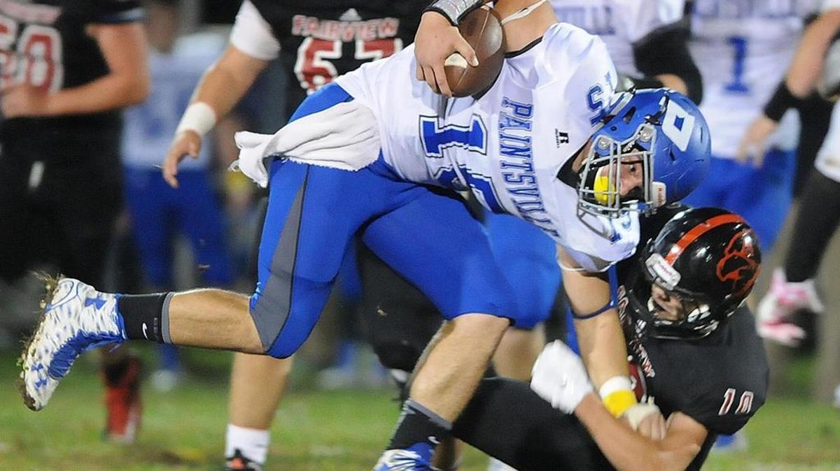 Paintsville’s Kash Daniel runs against Fairview’s Ryan Ekers during a high school football game Friday, Oct. 9, 2015, in Westwood, Ky. Paintsville won 38-12.