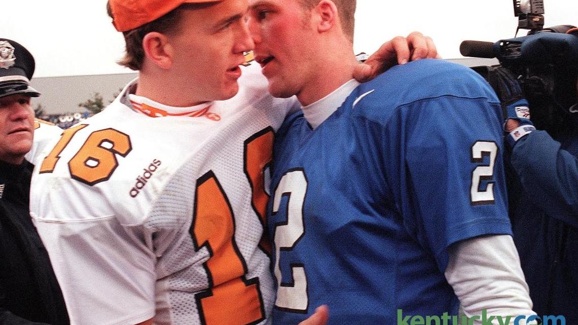 Tennessee's Peyton Manning and Kentucky's Tim Couch, after the Volunteers 59-31 win over the Cats, Nov. 22, 1997 at Commonwealth Stadium in Lexington.