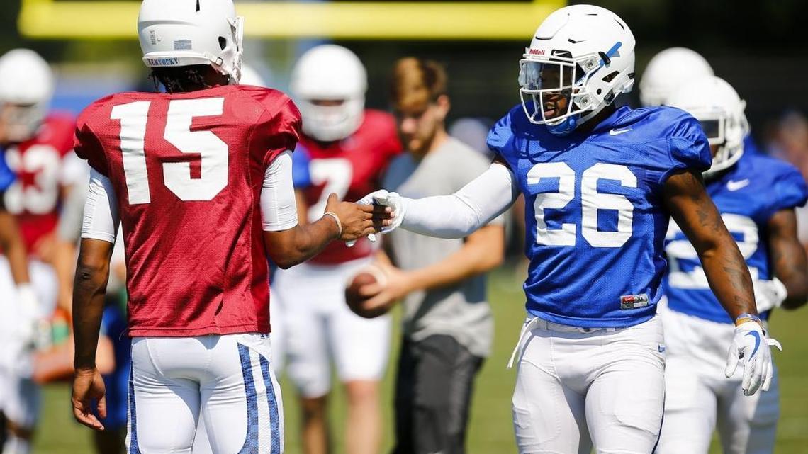 Kentucky quarterback Stephen Johnson (15) and running back Benny Snell Jr. (26) teamed up during the Wildcats’ practice last Saturday.