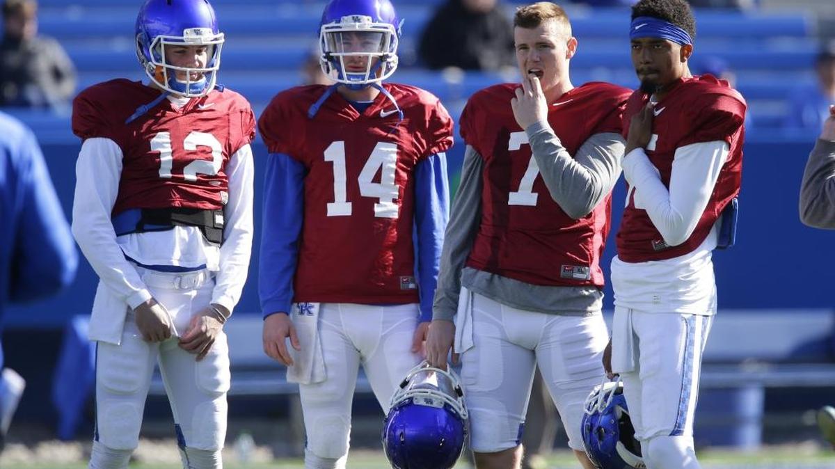Kentucky quarterbacks Gunnar Hoak (12), Luke Wright (14), Drew Barker (7) and Stephen Johnson (15) will be joined in spring practice by early-enrolling freshmen Danny Clark and Walker Wood.