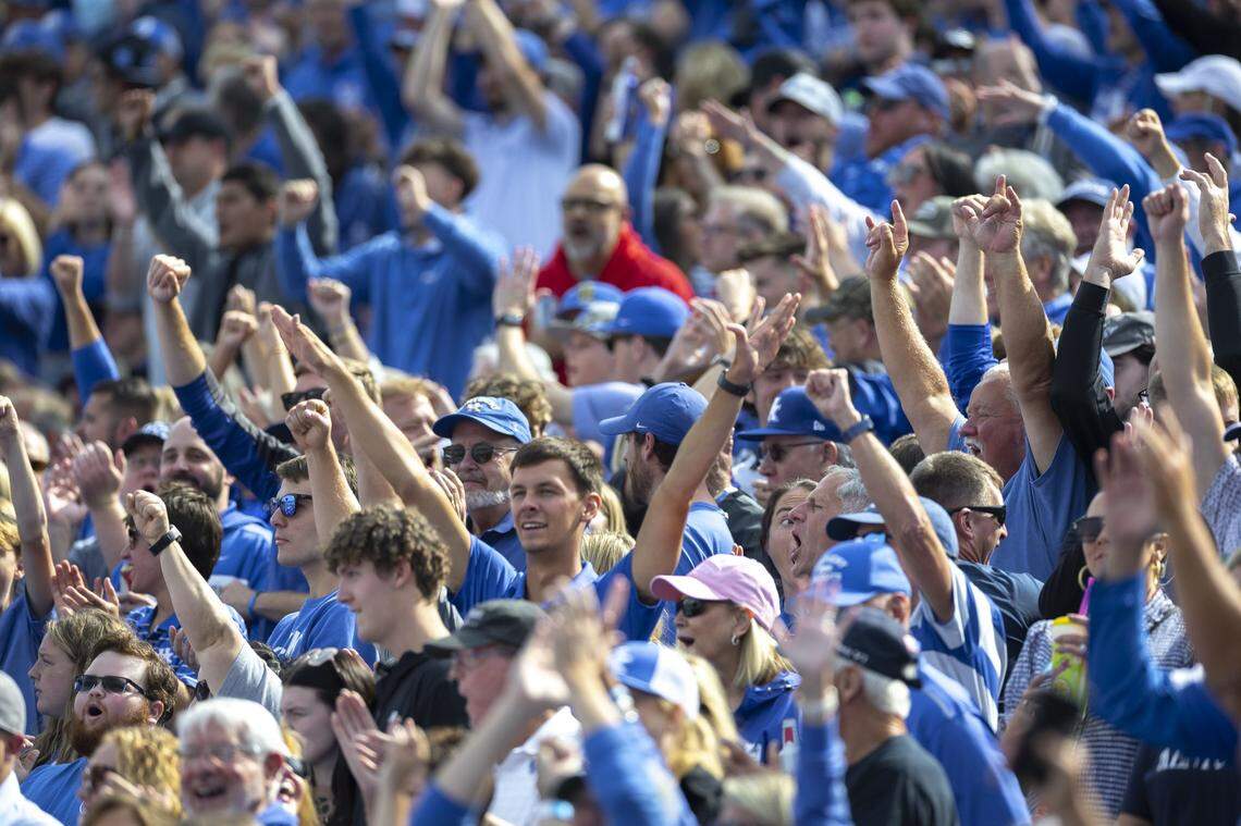 Kentucky fans cheer during a game between the Wildcats and Ole Miss at Kroger Field last Saturday. The crowd was UK’s smallest at home for a game against a ranked opponent in 10 years.