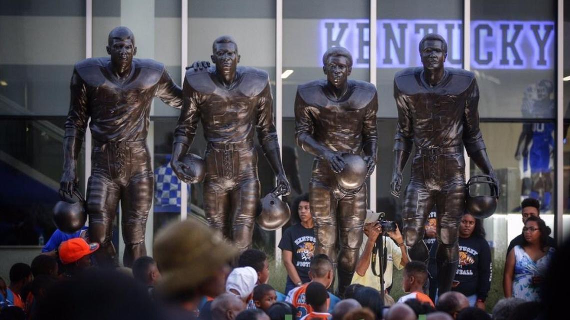 UK unveiled a statue Thursday recognizing the school’s first black football players.