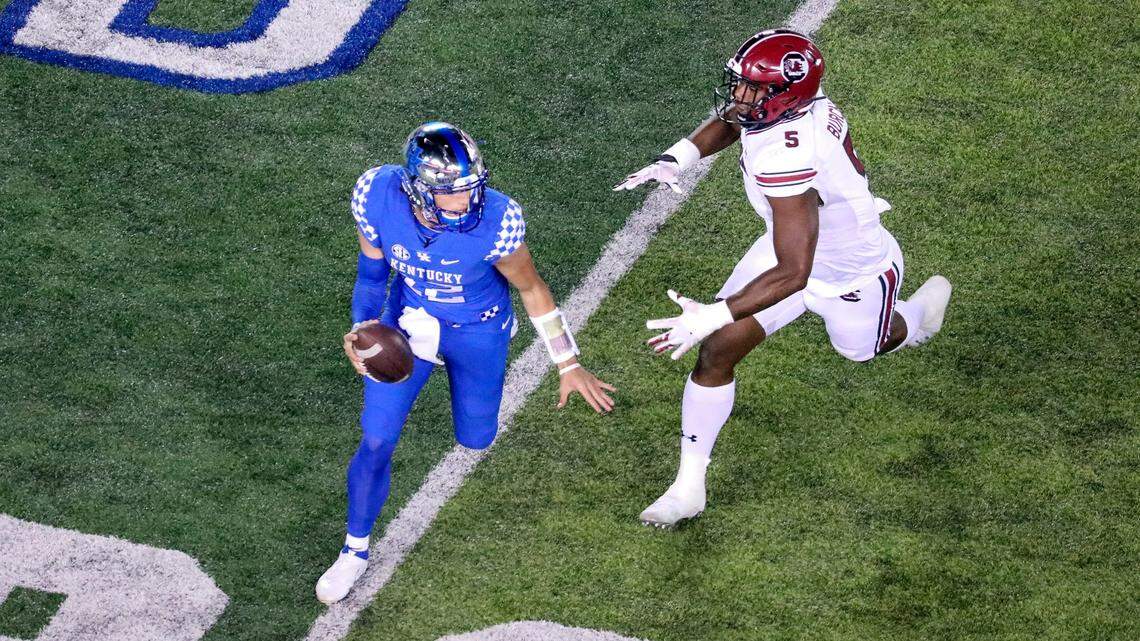How far did Kentucky fall in college football rankings after loss to South Carolina?