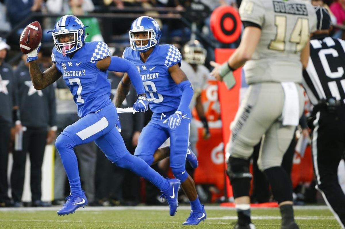 Kentucky Wildcats safety Mike Edwards (7) ran down field after intercepting Vanderbilt quarterback Kyle Shurmur in UK’s 44-21 victory at Vandy last season.