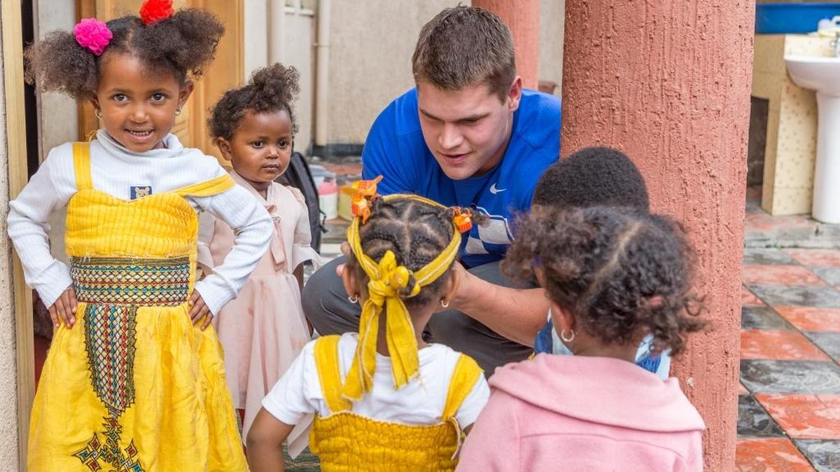 Tight end Greg Hart spent some time with children in Ethiopia on a UK Athletics service trip this summer.
