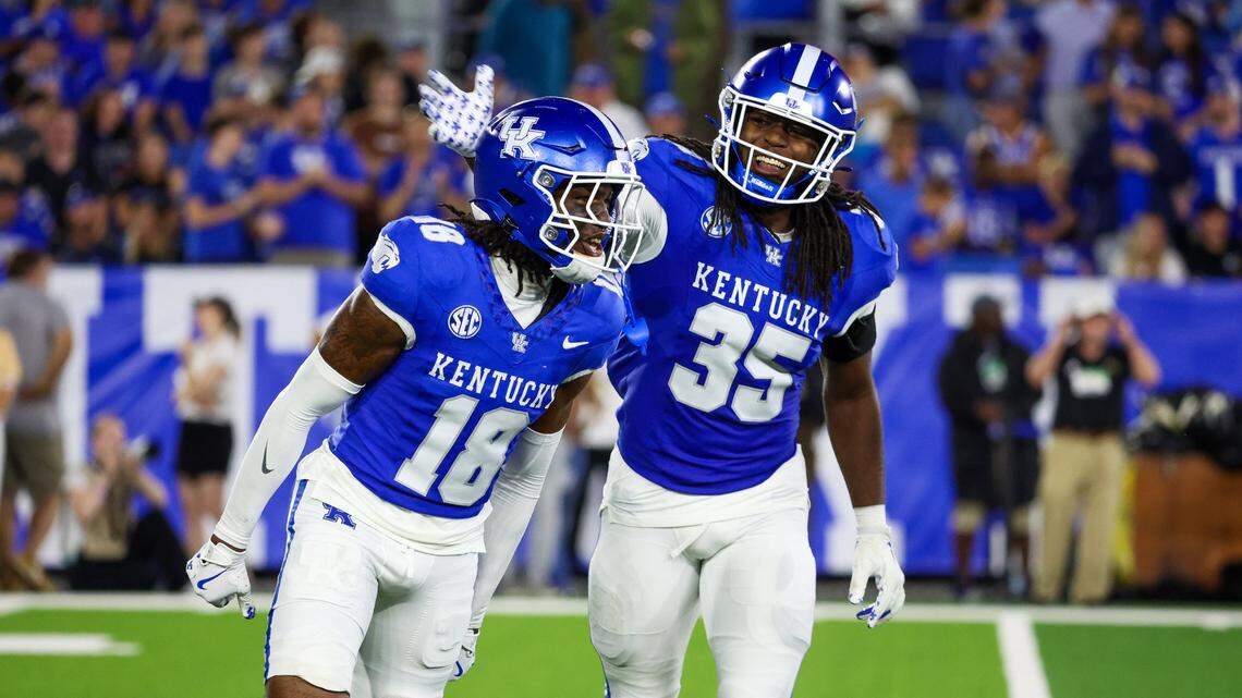 Kentucky defensive back Cam Dooley (18) and linebacker Steven Soles Jr. (35) are among the freshmen playing regularly through three games.