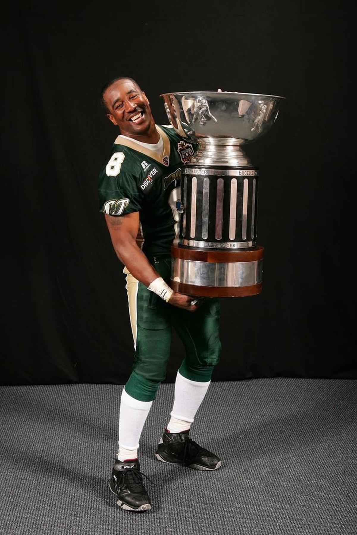 Clevan Thomas was photographed with the Foster ArenaBowl Trophy after the San Jose SaberCats’ 55-33 victory against the Columbus Destroyers to win ArenaBowl XXI on July 29, 2007.