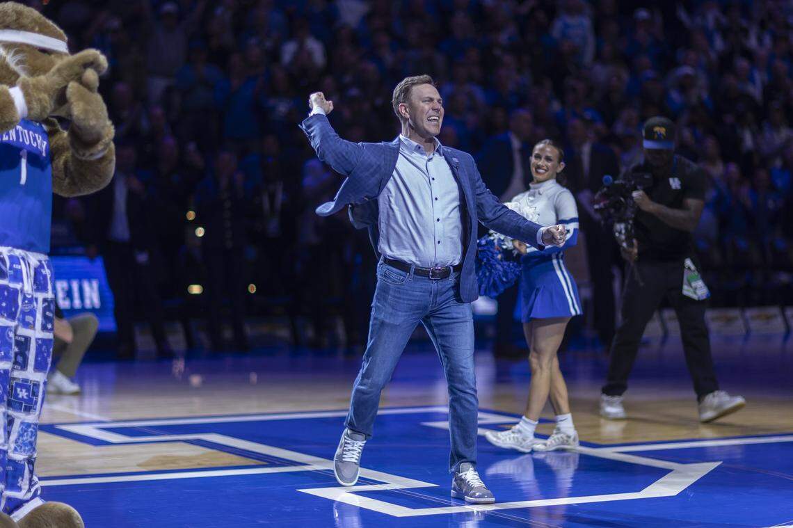 New Kentucky football coach Will Stein formed the Y in the UK cheerleaders’ traditional spelling of “Kentucky” in the first half of a game against North Carolina at Rupp Arena on Dec. 2, 2025.