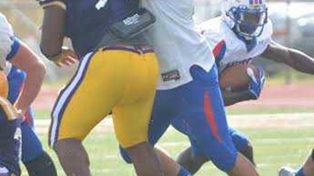 Tate Leavitt of Hutchinson (Kan.) Community College blocked during a game last season.
