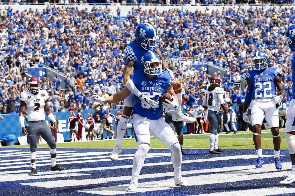 Kentucky Wildcats wide receiver Blake Bone (6) celebrated a touchdown with tight end C.J. Conrad (87) during their game against Eastern Kentucky at Kroger Field in Lexington, Ky., Saturday, Sept. 9. 2017.